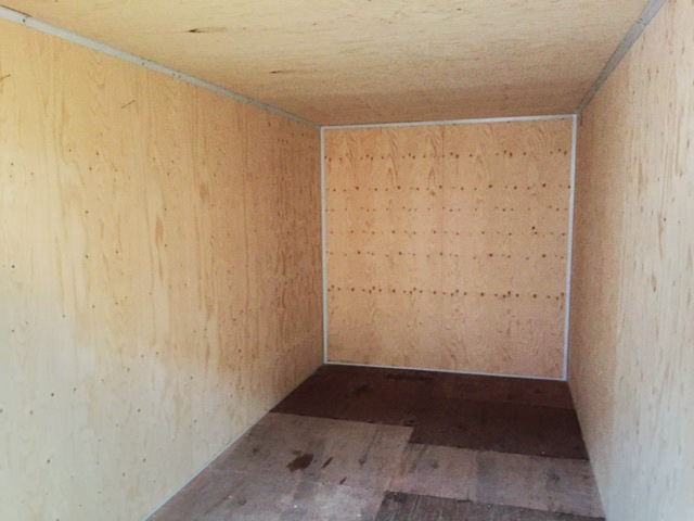 Isolerad container klädd med träpanel